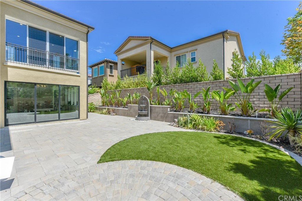 18 Tomango Lake Forest, CA 92630 - Photo 41 of 45 a front view of a house with garden