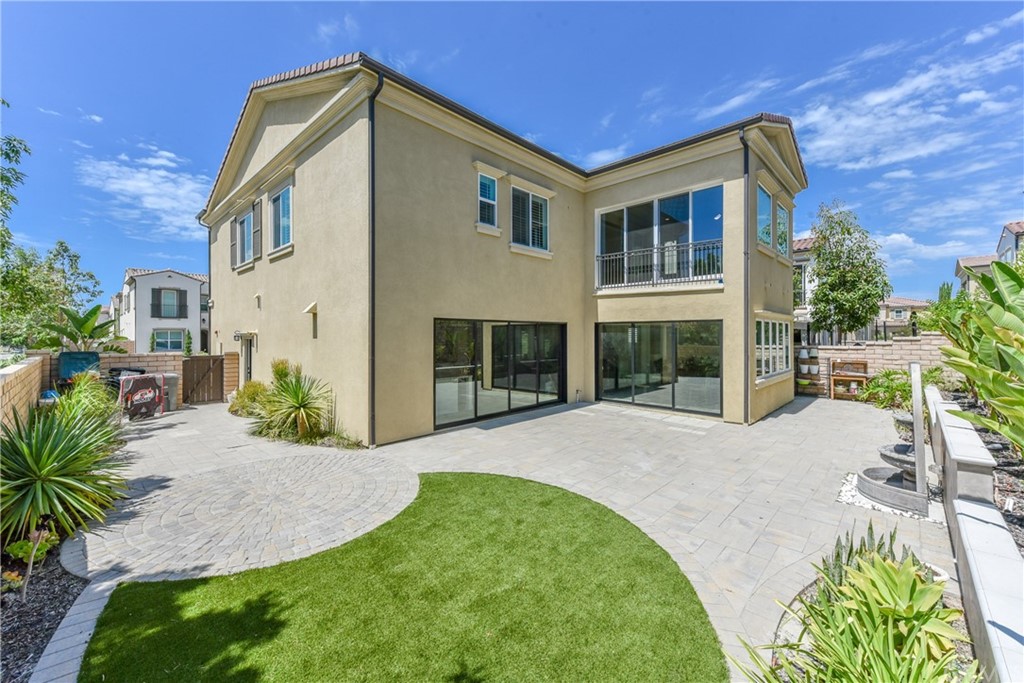 18 Tomango Lake Forest, CA 92630 - Photo 44 of 45 a front view of a house with a garden