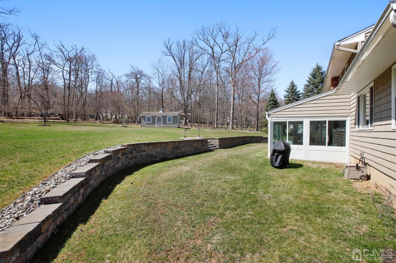 975 Carteret Road Bridgewater, NJ 08807 - Photo 22 of 25 a view of a house with backyard porch and garden
