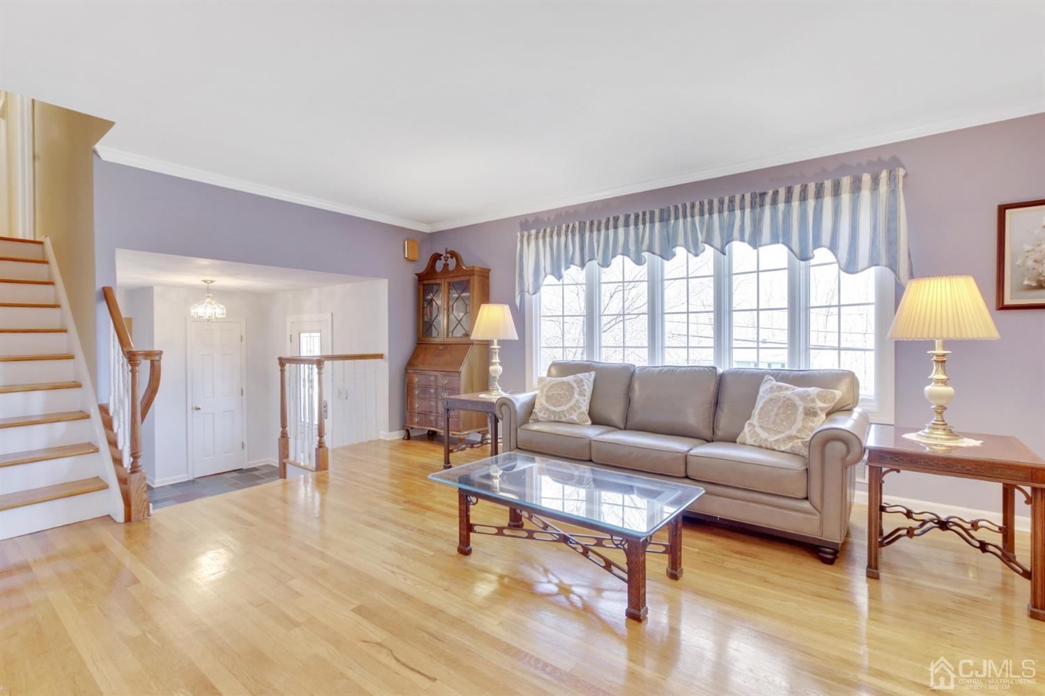 975 Carteret Road Bridgewater, NJ 08807 - Photo 5 of 25 a living room with furniture and a table