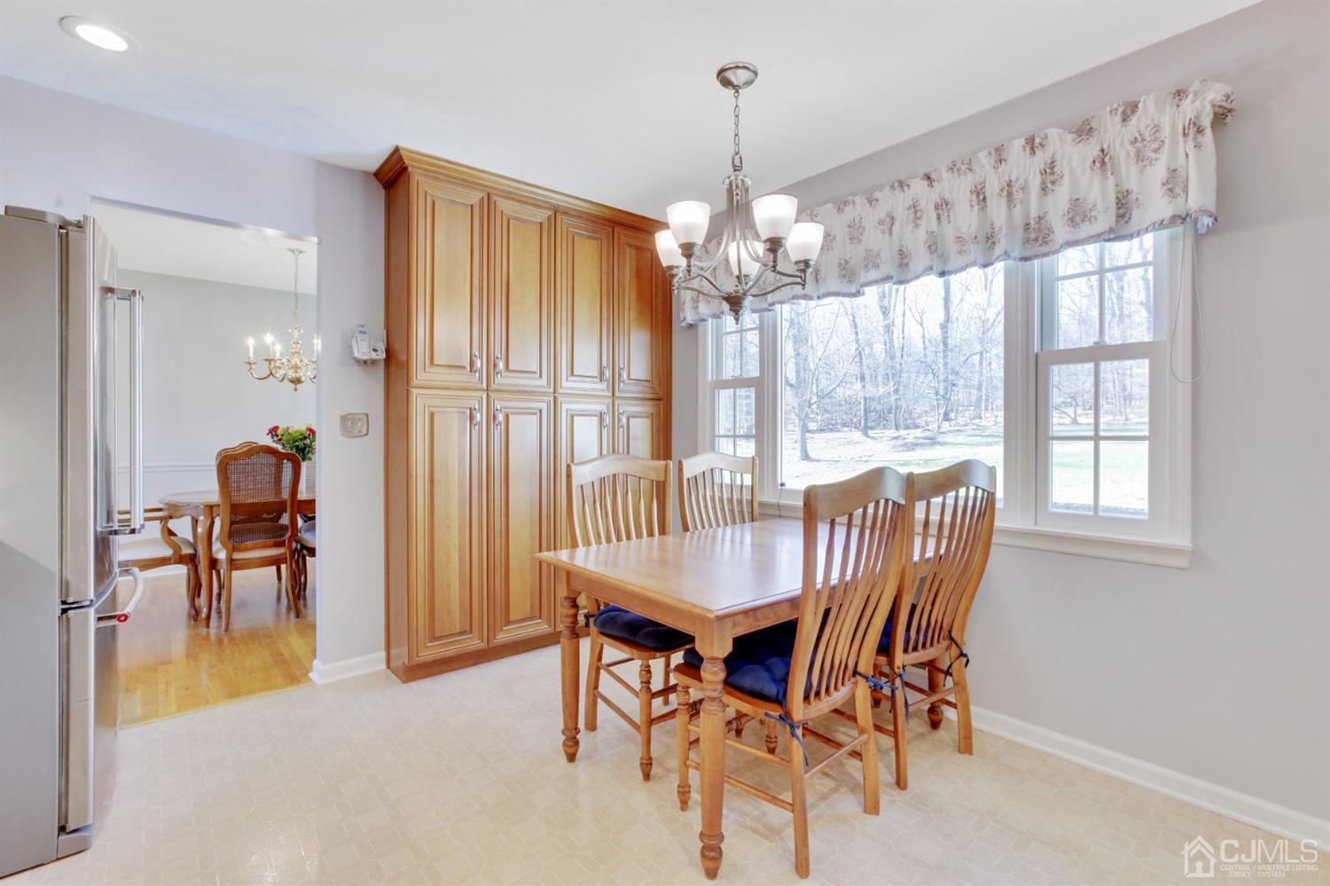 975 Carteret Road Bridgewater, NJ 08807 - Photo 9 of 25 a view of a dining room with furniture window and outside view