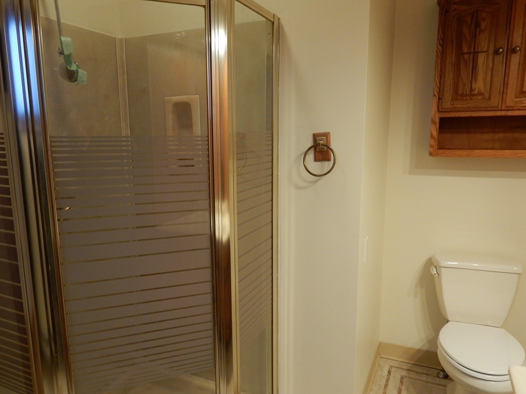 63 Bucknam Street Everett, MA 02149 - Photo 24 of 28 a bathroom with a toilet