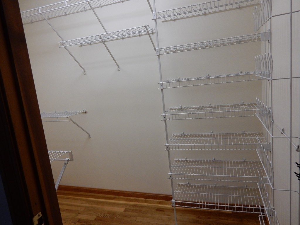 63 Bucknam Street Everett, MA 02149 - Photo 25 of 28 a view of small space with racks on the wall