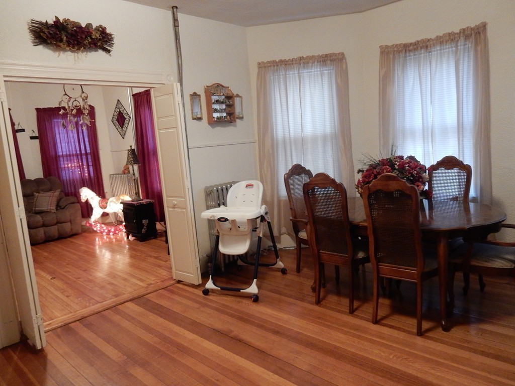 63 Bucknam Street Everett, MA 02149 - Photo 10 of 28 a view of a room with gym equipment