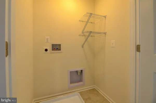 a bathroom with a sink a mirror and a toilet