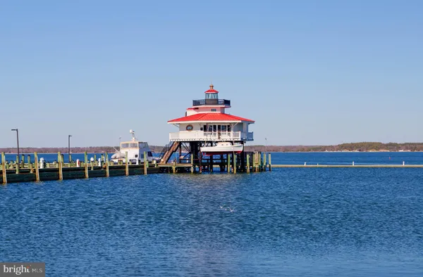 an aerial view of a house with outdoor space