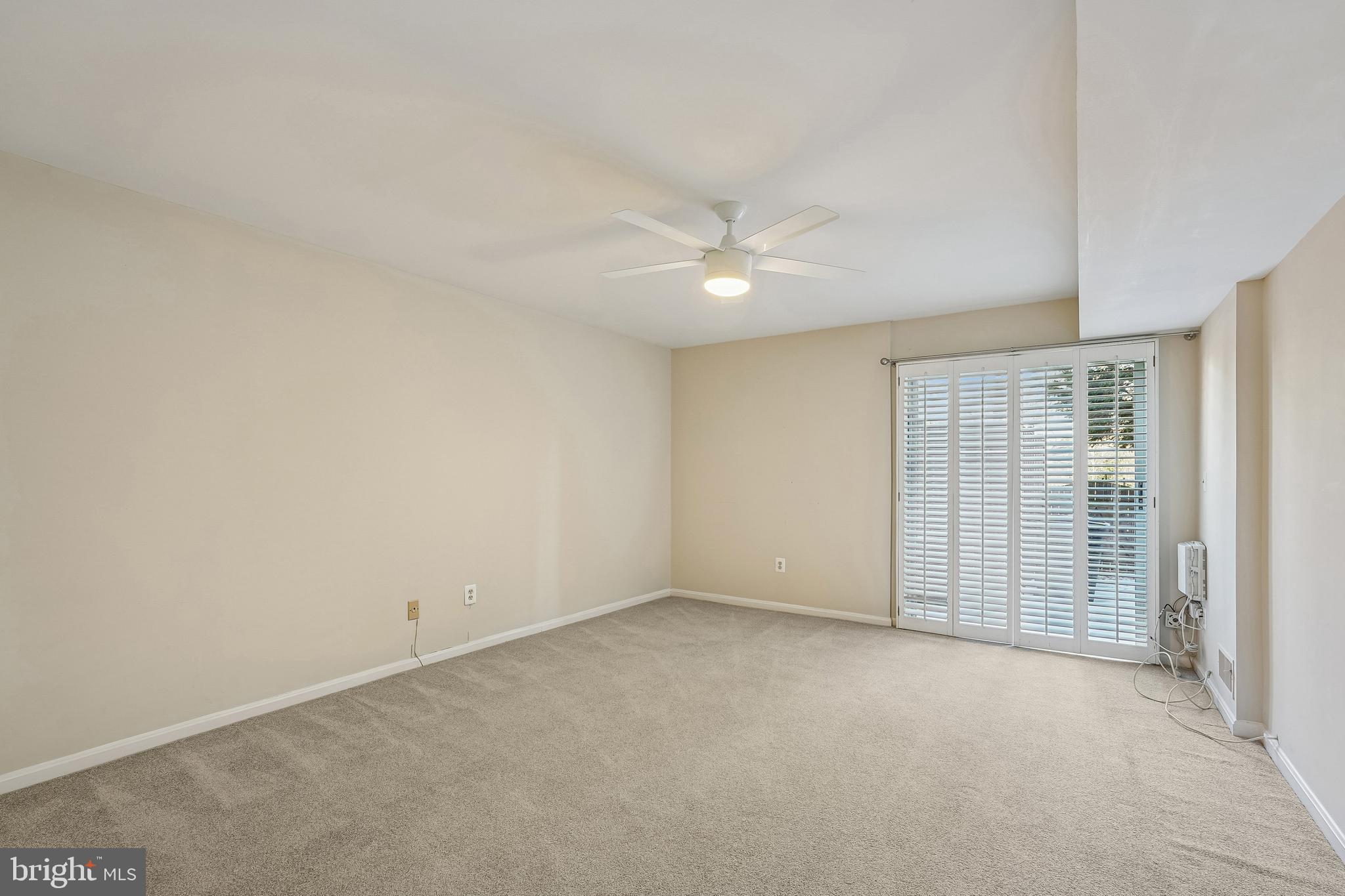 4821 Sangamore Road, Unit 12 Bethesda, MD 20816 - Photo 15 of 22 Bedroom #2 opens to the Patio