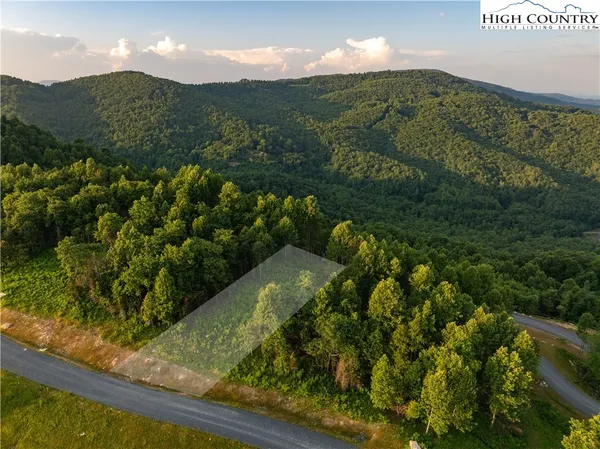 a view of a yard from a balcony
