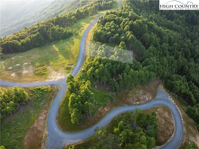 a view of a lake from a balcony