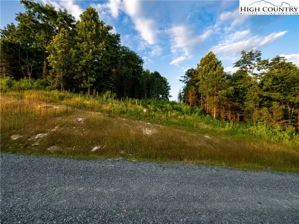 a view of mountain with lake