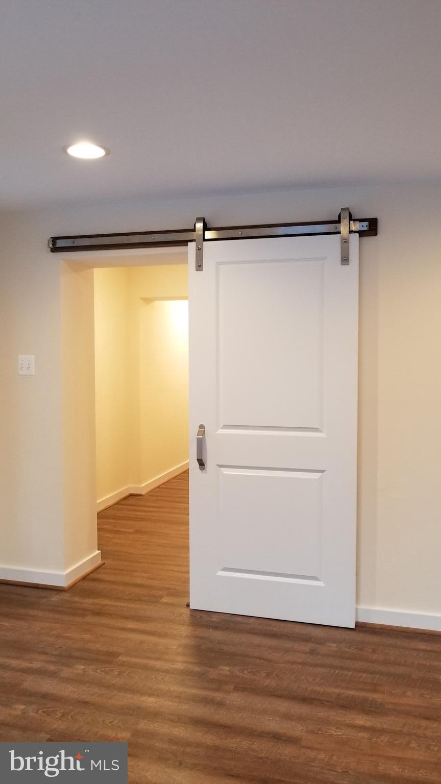7821 Rocky Springs Road Frederick, MD 21702 - Photo 5 of 30 Barn door feature, garage accessibility