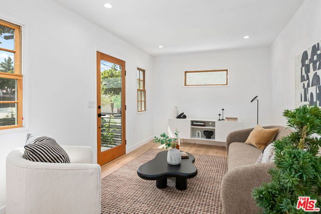 a kitchen with stove and cabinets