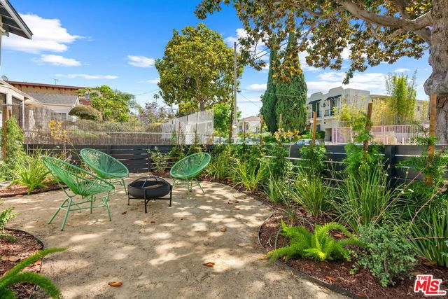 a garden view with a seating space