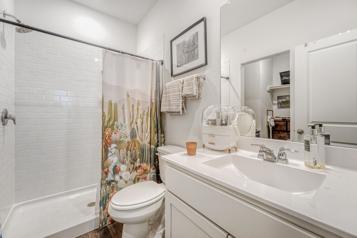 549 Arnold Loop, Unit A Kyle, TX 78640 - Photo 12 of 16 a bathroom with a sink toilet and shower
