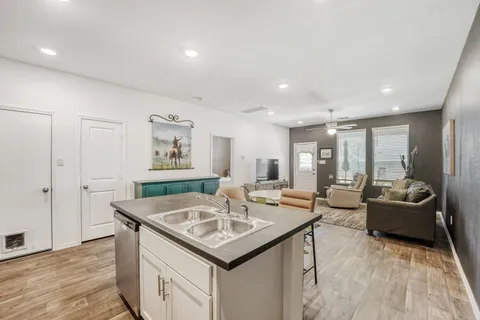 a living room with furniture and a table