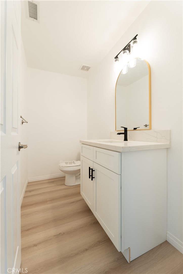 16925 Nanticoke Road Apple Valley, CA 92307 - Photo 60 of 87 a bathroom with a sink and a mirror