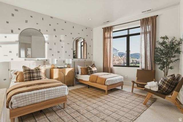 923 North Emery Lane Elk Ridge, UT 84651 - Photo 62 of 101 Bright room featuring a large black-framed window, patterned accent wall, and recessed lighting