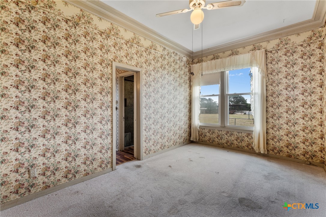 2967 South Old Robinson Road Lorena, TX 76655 - Photo 23 of 41 a view of a hallway with a chandelier