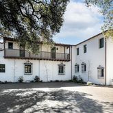 front view of a house with a street