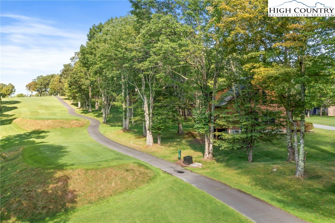 105 Old Field Road Beech Mountain, NC 28604 - Photo 13 of 43 a view of a backyard