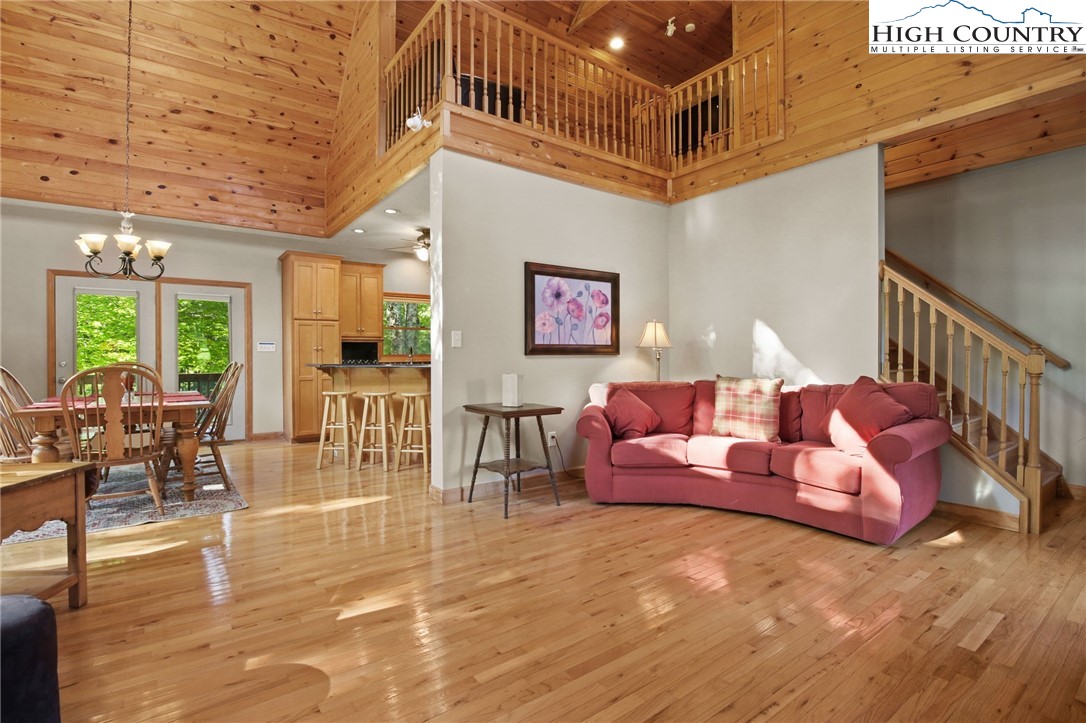 105 Old Field Road Beech Mountain, NC 28604 - Photo 17 of 43 a living room with furniture and wooden floor