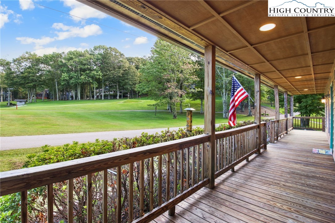 105 Old Field Road Beech Mountain, NC 28604 - Photo 7 of 43 a view of a porch and garden