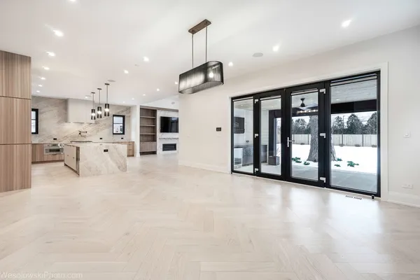 a kitchen with stainless steel appliances a stove sink and cabinets