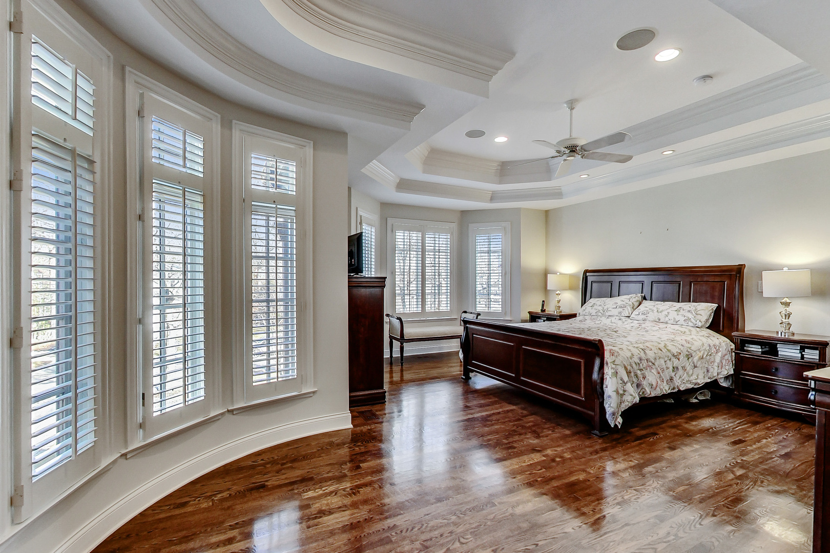 772 Walden Road Winnetka, IL 60093 - Photo 21 of 55 a spacious bedroom with a bed and a large window