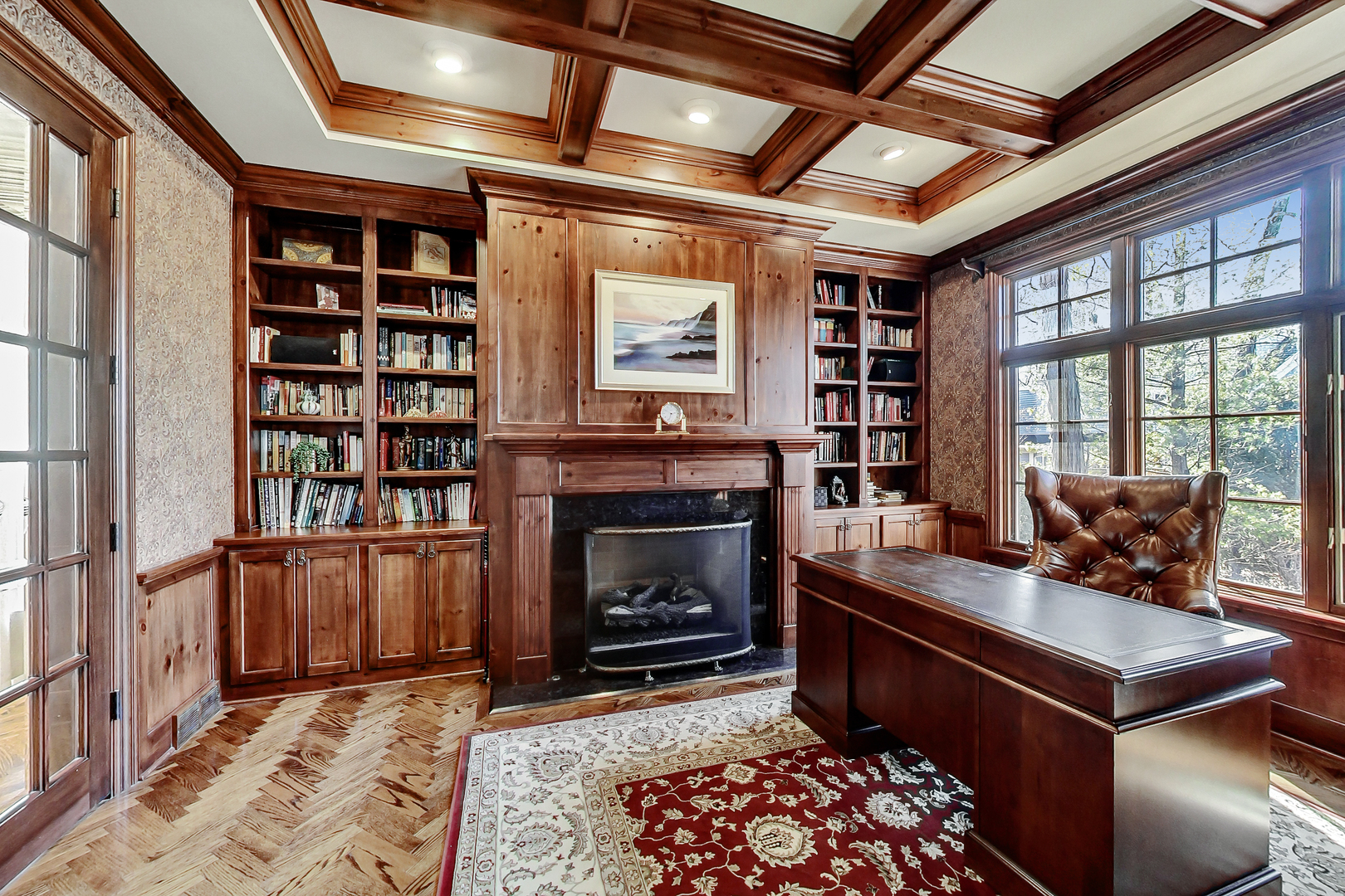 772 Walden Road Winnetka, IL 60093 - Photo 22 of 55 a living room with furniture and a fireplace