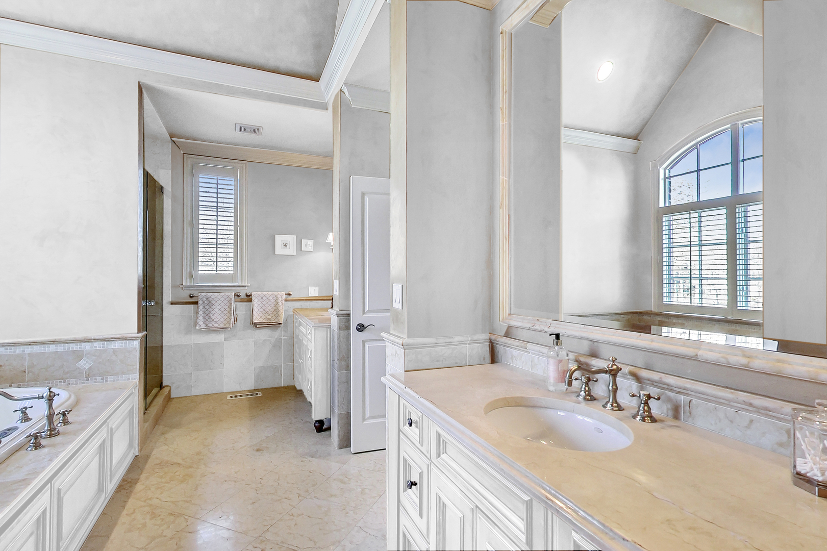 772 Walden Road Winnetka, IL 60093 - Photo 25 of 55 a bathroom with a granite countertop tub sink and mirror