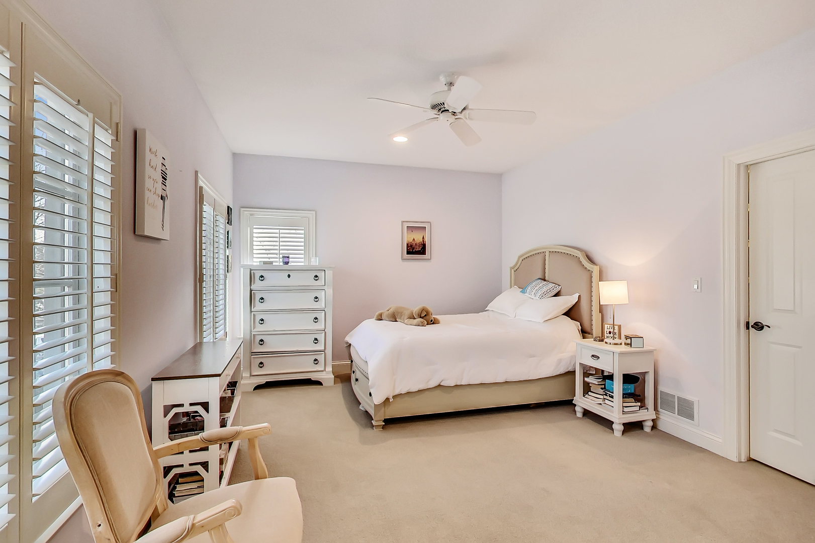 772 Walden Road Winnetka, IL 60093 - Photo 27 of 55 a bedroom with bed and a chair