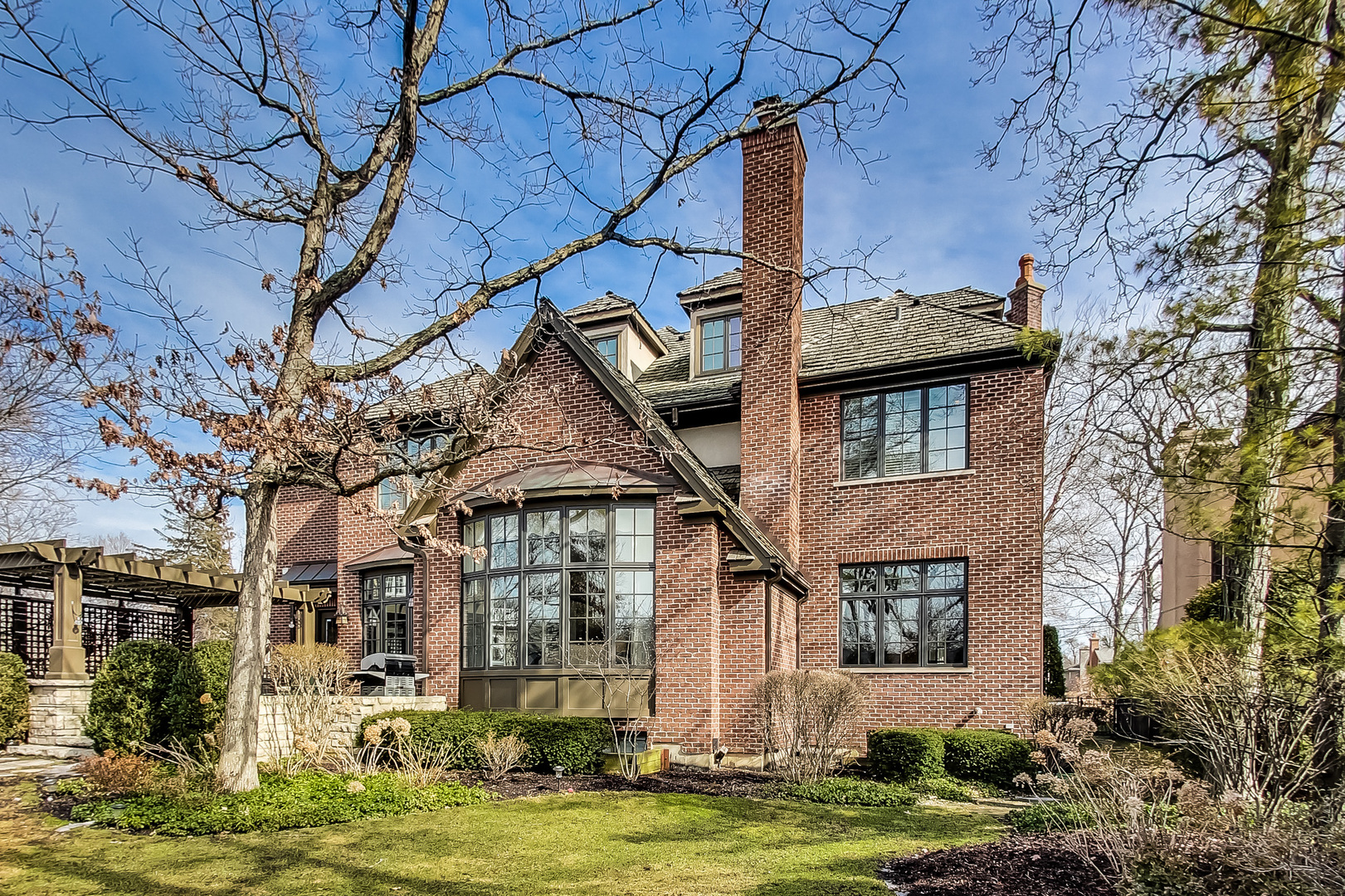 772 Walden Road Winnetka, IL 60093 - Photo 45 of 55 a front view of a house with a yard