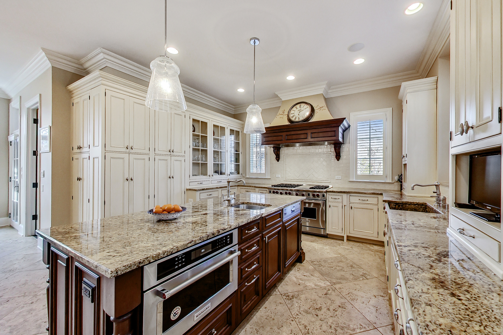 772 Walden Road Winnetka, IL 60093 - Photo 10 of 55 a kitchen with granite countertop a stove and a sink