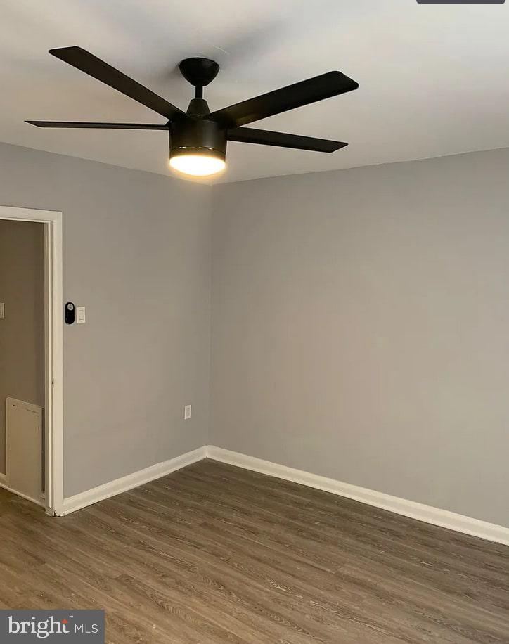 6644 North 8th Street, Unit A4 Philadelphia, PA 19126 - Photo 5 of 9 a view of an empty room with wooden floor