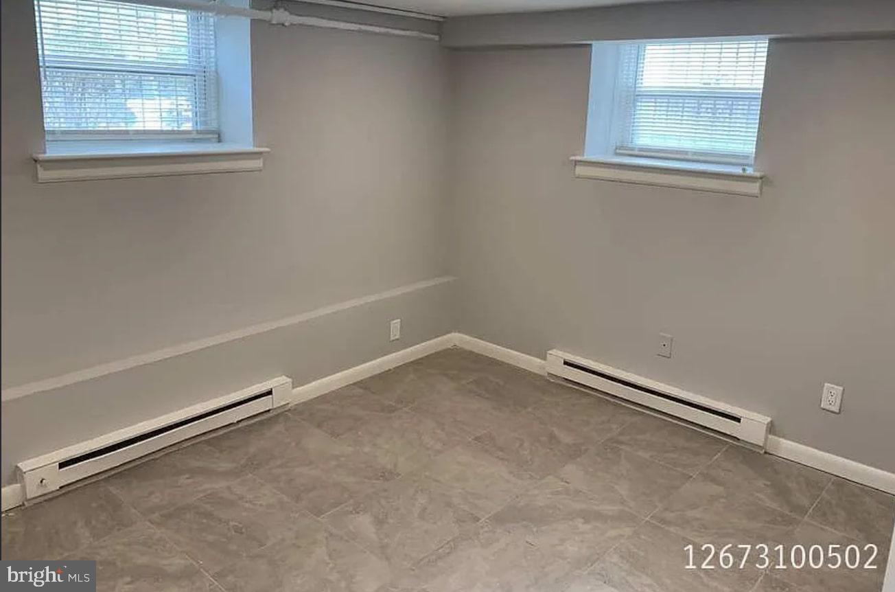 6644 North 8th Street, Unit A4 Philadelphia, PA 19126 - Photo 8 of 9 an empty room with a window