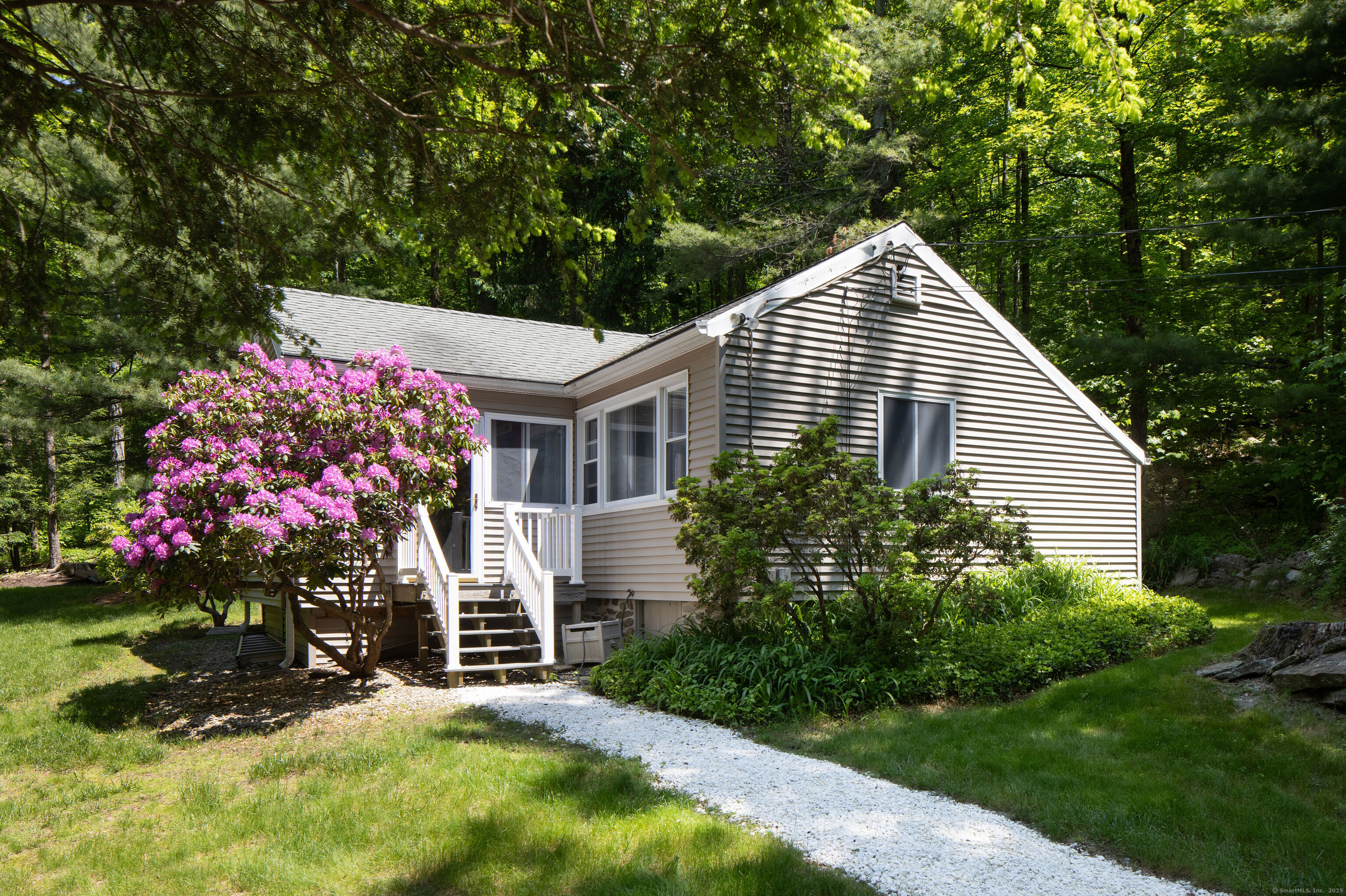 174 Bunker Hill Road Cornwall, CT 06796 - Photo 1 of 16 a front view of a house with a yard