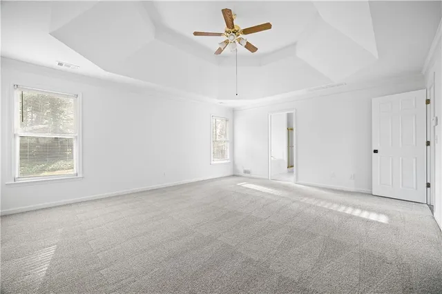 a bathroom with a shower sink and mirror