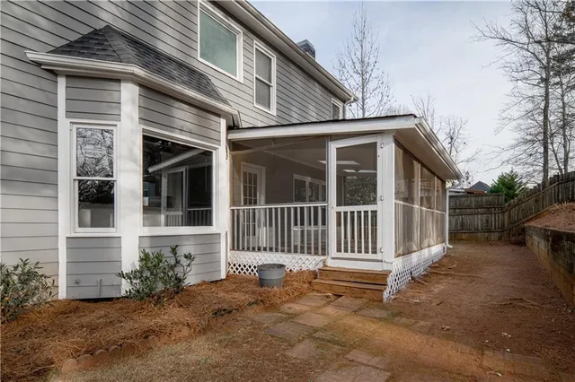 a view of road with large trees