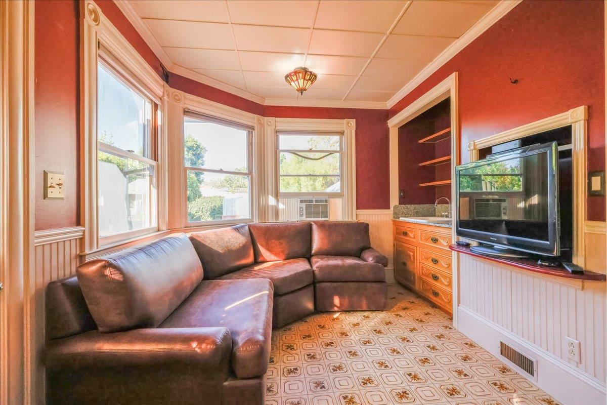 1167 Settle Avenue San Jose, CA 95125 - Photo 12 of 35 a living room with furniture and a flat screen tv