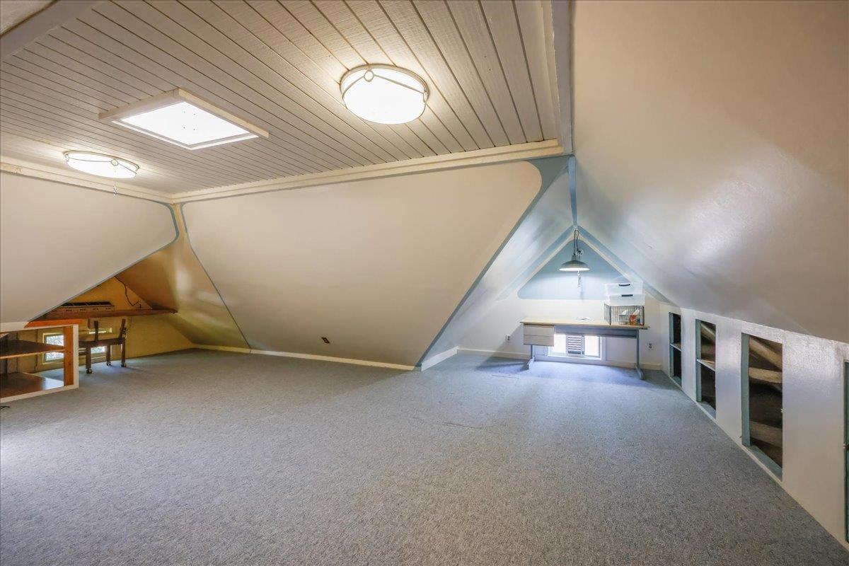 1167 Settle Avenue San Jose, CA 95125 - Photo 28 of 35 a view of a livingroom with wooden floor and stairs
