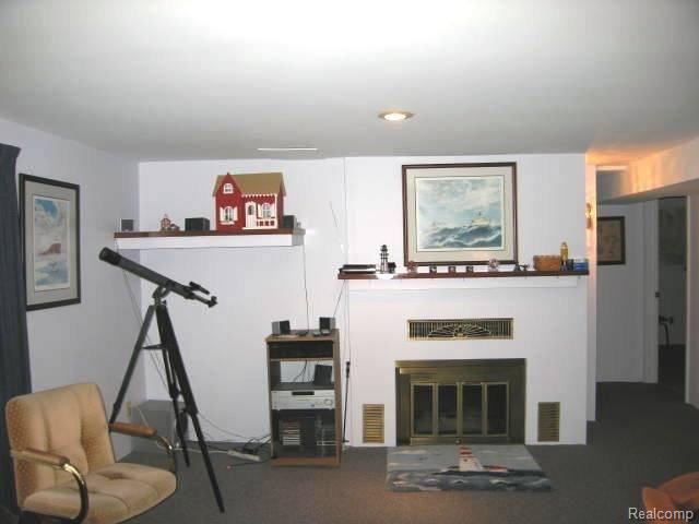 1019 North River Road St. Clair, MI 48079 - Photo 8 of 16 Lower Level Gas Fireplace