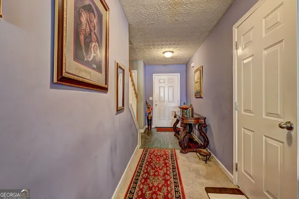 a view of entryway and hall