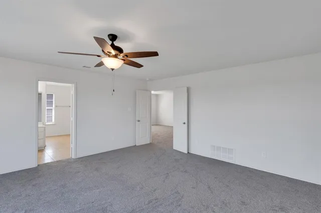 a a ceiling fan in a room