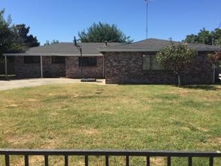 2077 Larkin Road Biggs, CA 95917 - Photo 3 of 11 a view of a swimming pool with a yard