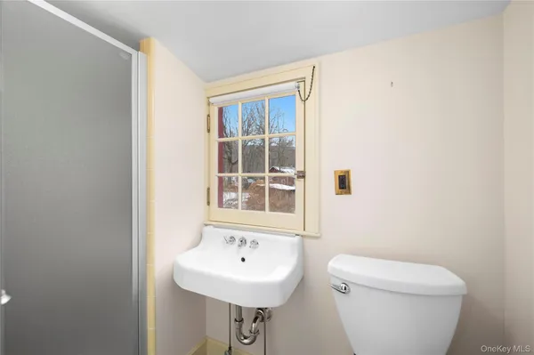 a picture of a bathroom with a sink