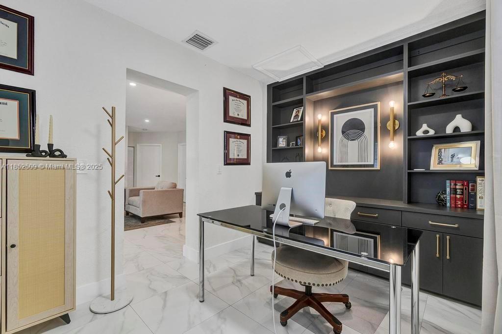 6470 Southwest 27th Street Miami, FL 33155 - Photo 25 of 38 a room with furniture