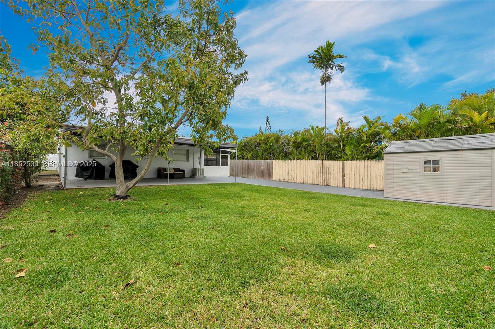 6470 Southwest 27th Street Miami, FL 33155 - Photo 35 of 38 a view of a backyard with a garden