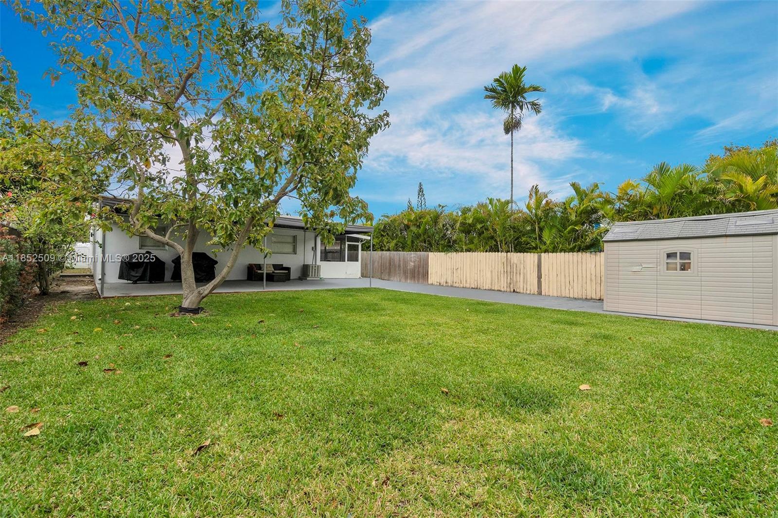6470 Southwest 27th Street Miami, FL 33155 - Photo 35 of 38 a view of a house with a backyard
