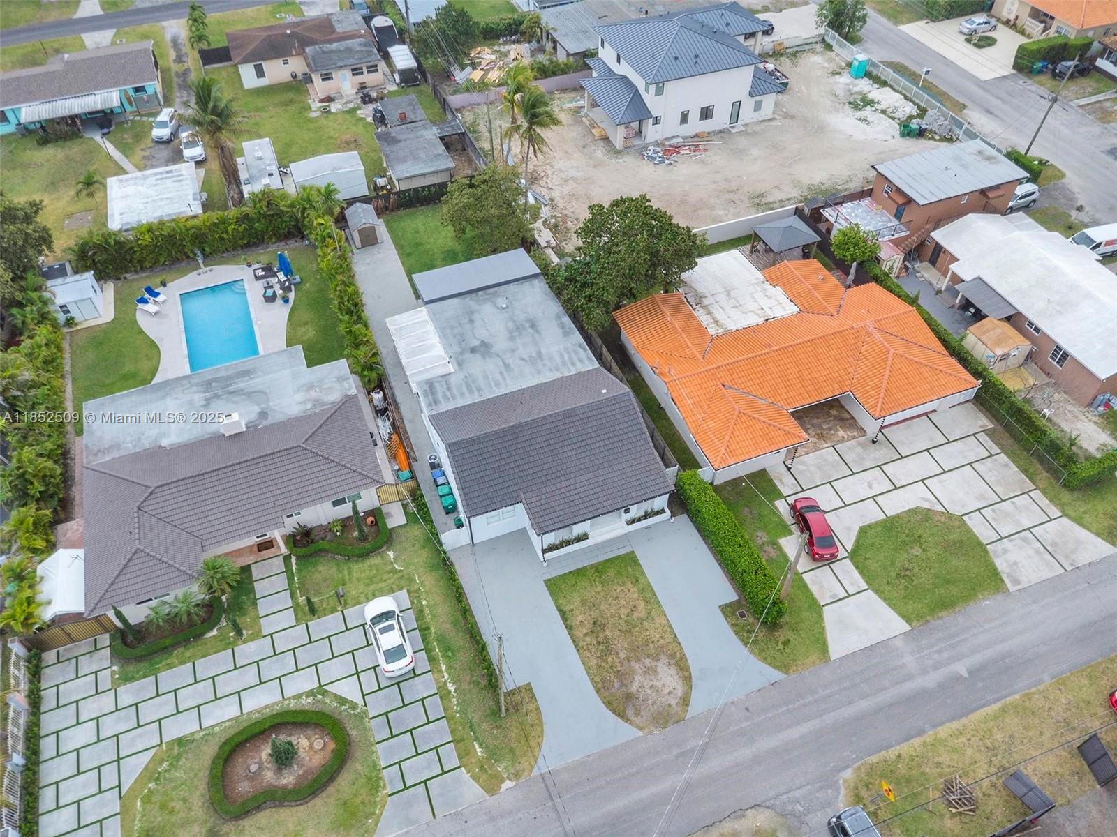 6470 Southwest 27th Street Miami, FL 33155 - Photo 36 of 38 an aerial view of residential houses with outdoor space