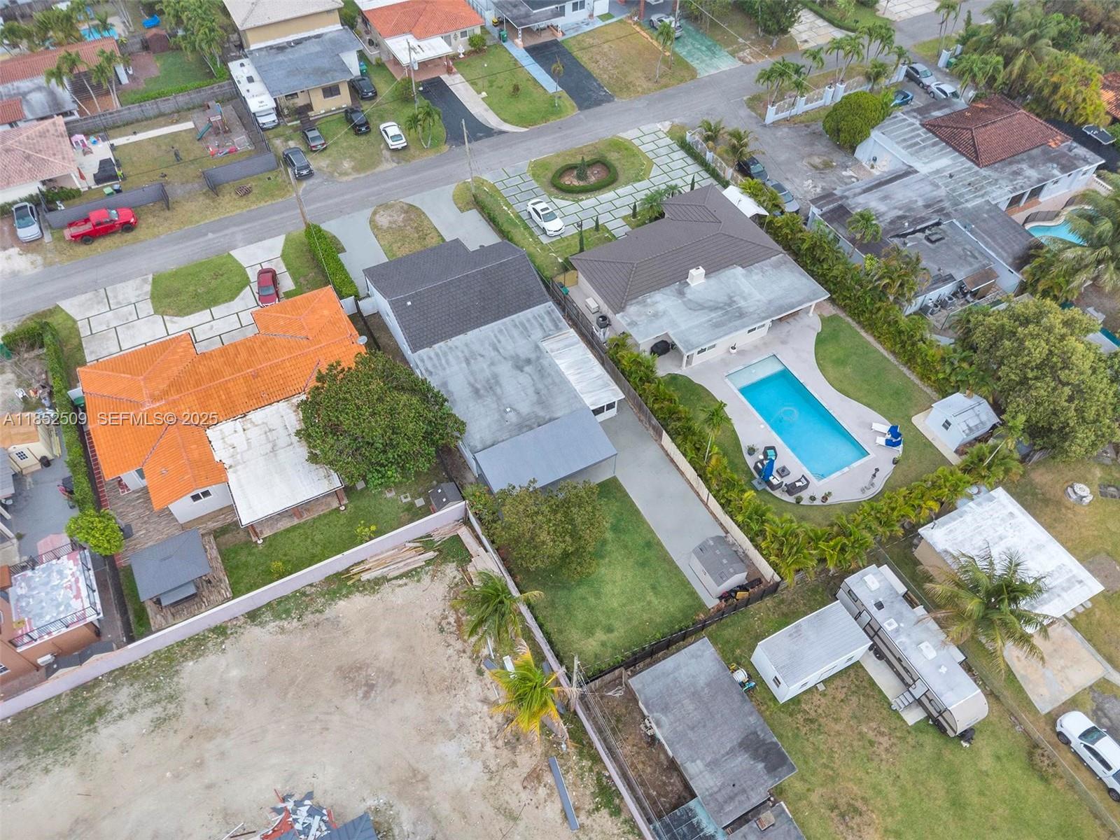 6470 Southwest 27th Street Miami, FL 33155 - Photo 37 of 38 an aerial view of residential houses with outdoor space